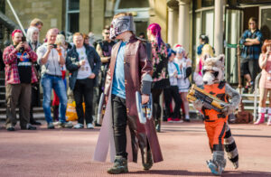 Cosplayers dressed as 'Star Lord' and 'Rocket Raccoon' from 'Guardians of the Galaxy'  during a cosplay competition at Sci-Fi Scarborough.